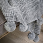 Load image into Gallery viewer, Grey Knitted Pom Pom Throw

