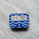 Load image into Gallery viewer, Blue tin with &#39;Quiz in a Tin&#39; label on a marble surface. General Knowledge
