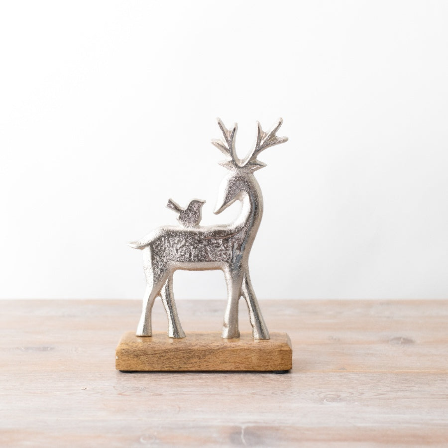 Silver Reindeer on wood Base