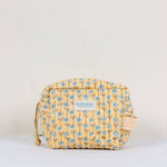 Load image into Gallery viewer, Yellow floral patterned washbag with &#39;bohemia&#39; branding on a white background
