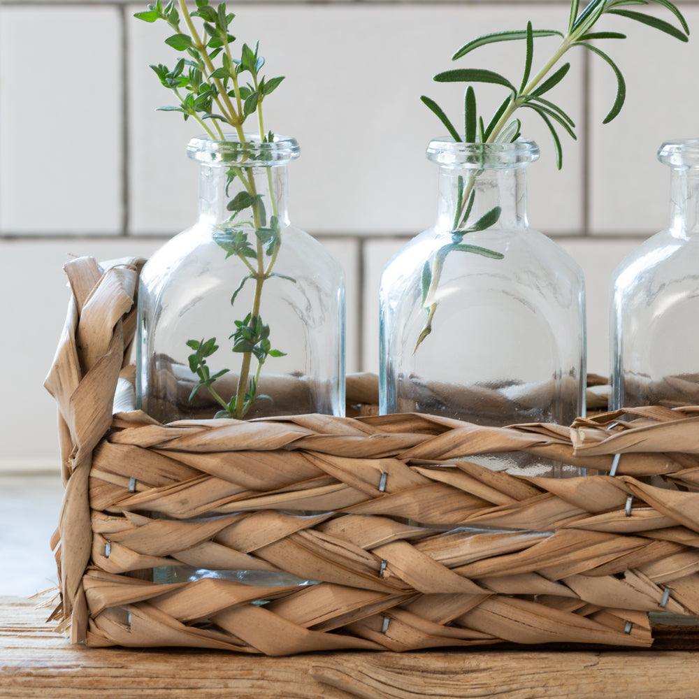 Straw Basket with Glass Bottles